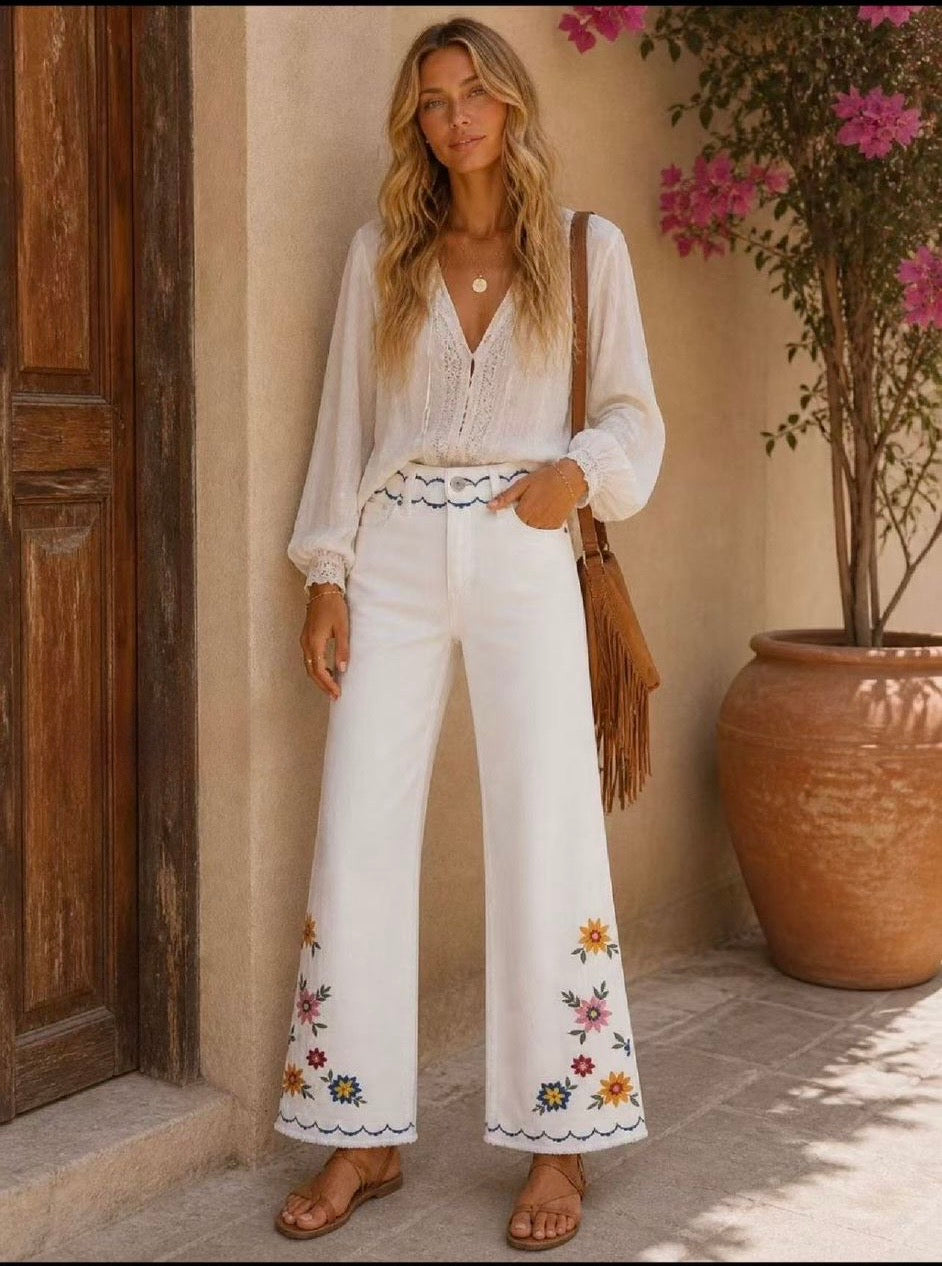 Jeans con ricami fiori