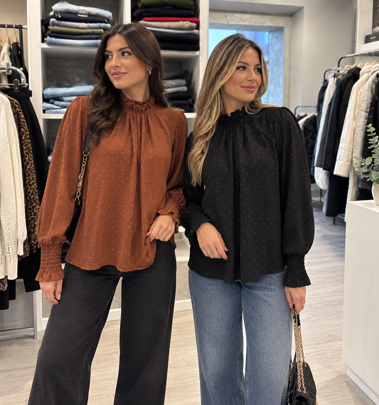 Blusa punti luce