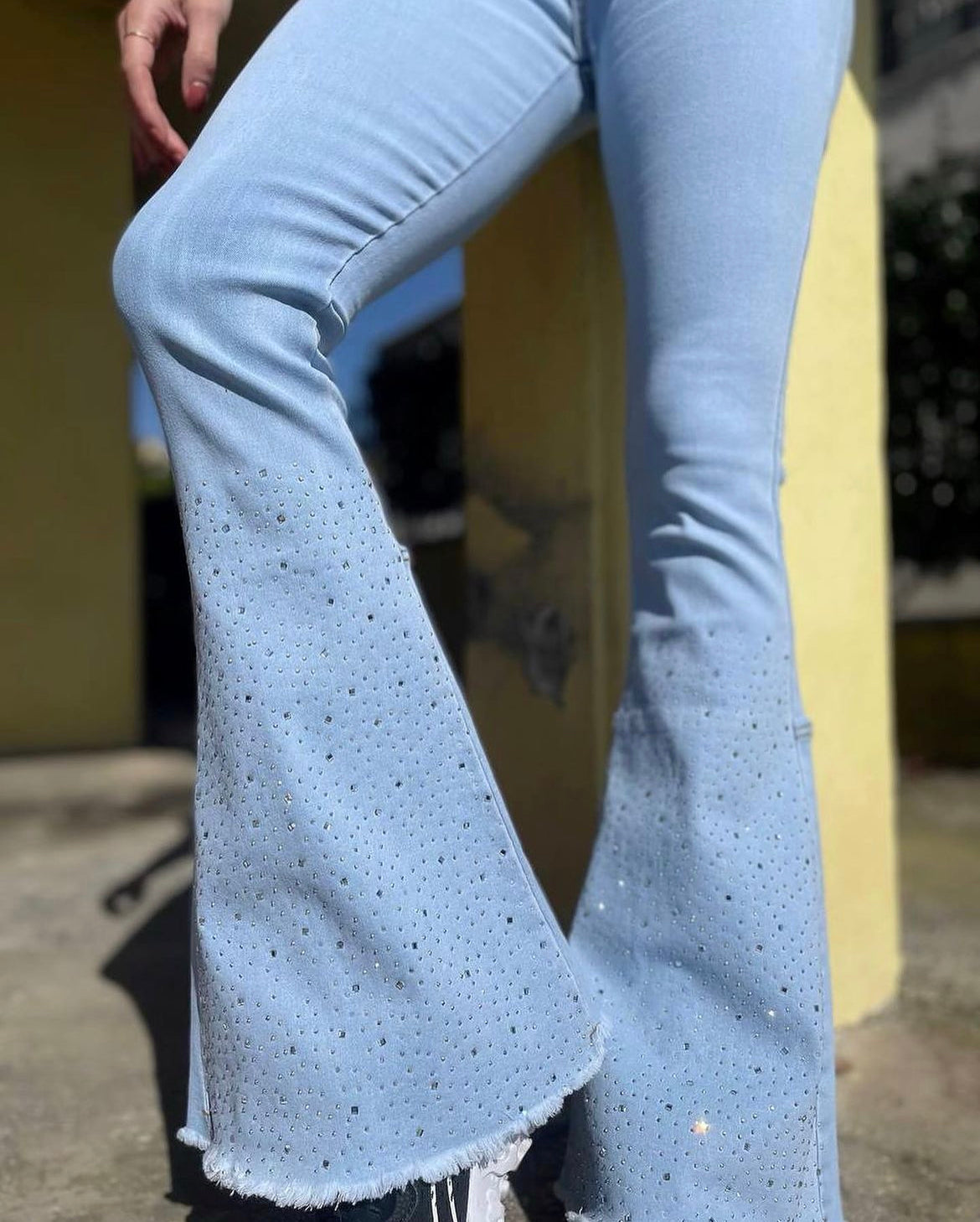 Jeans zampa strass